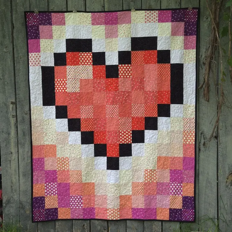 Computerized edge to edge longarm quilting by Spencer Hatman in upstate New York, featuring precision stitching on one of Spencer's quilts