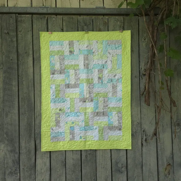 Computerized edge to edge longarm quilting by Spencer Hatman in upstate New York, featuring precision stitching on one of Spencer's quilts